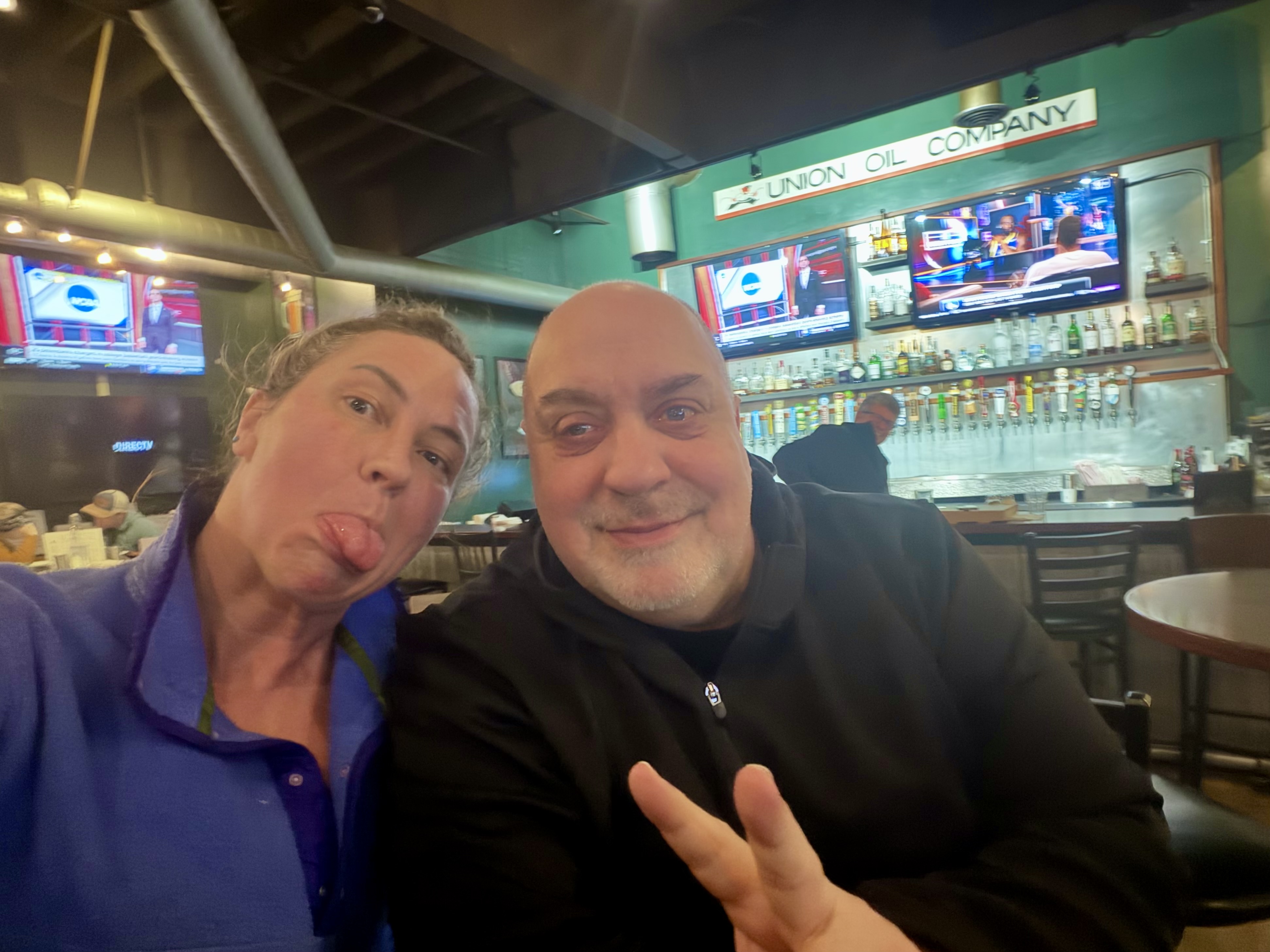 Guest smiling at Eagle River Alehouse